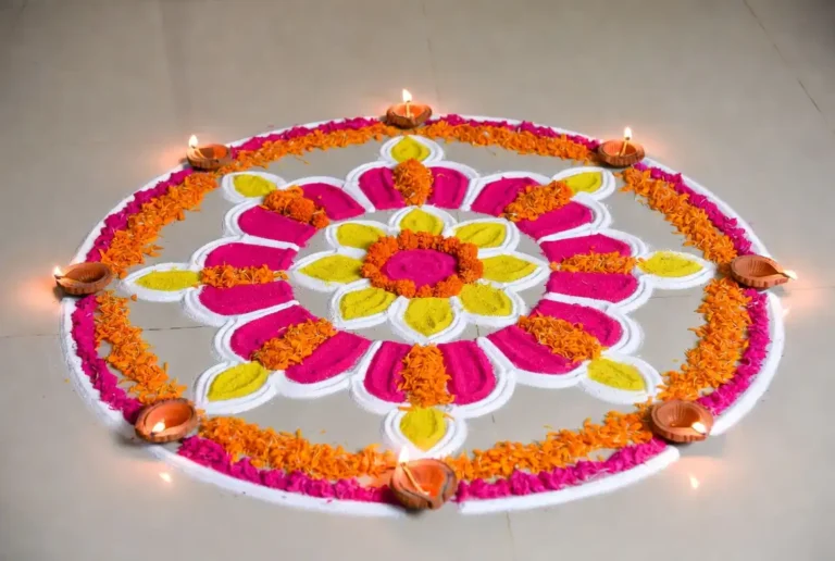 Colorful aesthetic rangoli design with floral patterns and diyas on floor
