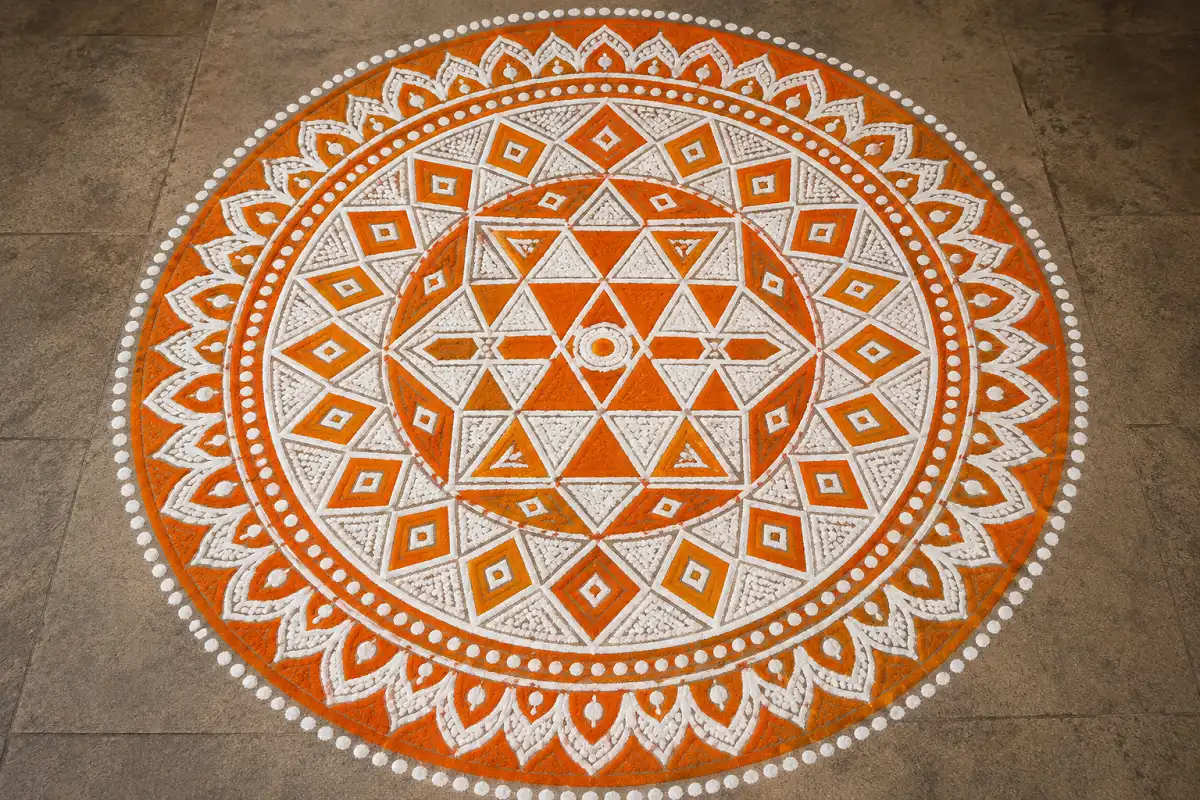 Big circle rangoli design featuring geometric patterns and bold colors