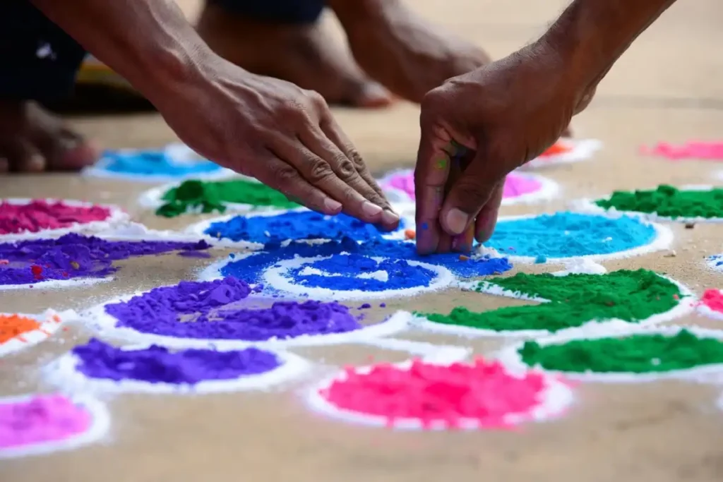 Large floral rangoli design with colorful petals