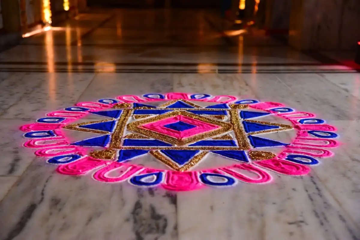 Geometric rangoli design for Diwali 2025 with symmetrical shapes in bright colors
