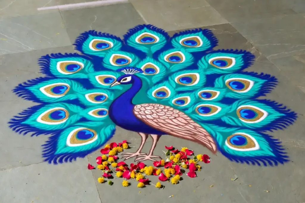 Colorful peacock diwali rangoli design with blue, green and gold powder