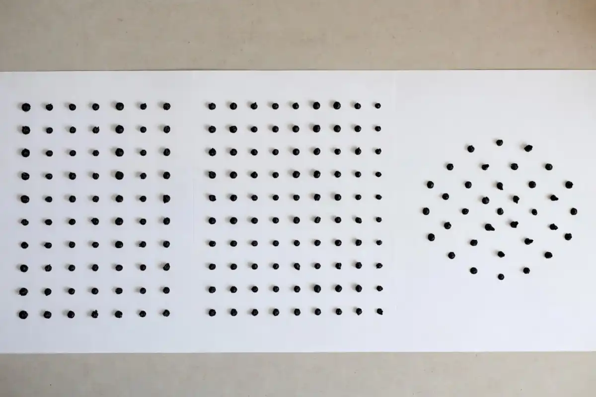 Three types of dot rangoli design grids shown side by side including straight, offset, and radial dot arrangements