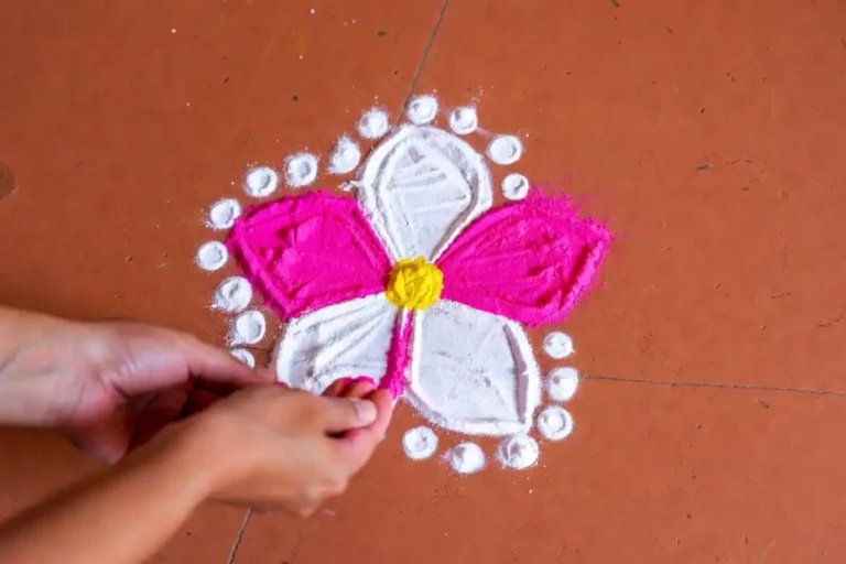 Simple easy flower rangoli design for beginners with five petals and dot border