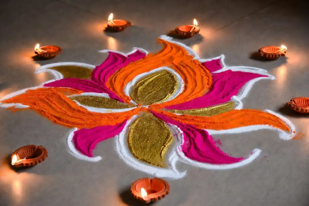 Colorful freehand diwali rangoli design simple and easy with petals and diyas