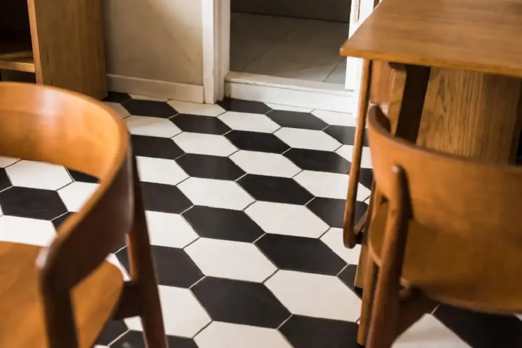 Modern interior room featuring black and white hexagonal patterned floor tiles