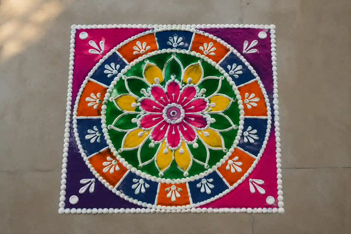 Colorful mandala rangoli inside a square border