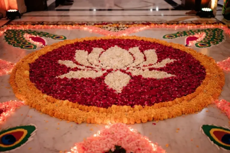 Elaborate multiflower rangoli design for wedding with rose and marigold petals