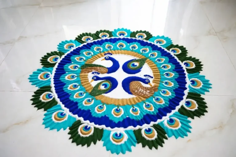 Colorful peacock circle rangoli design made with vibrant powder colors on floor