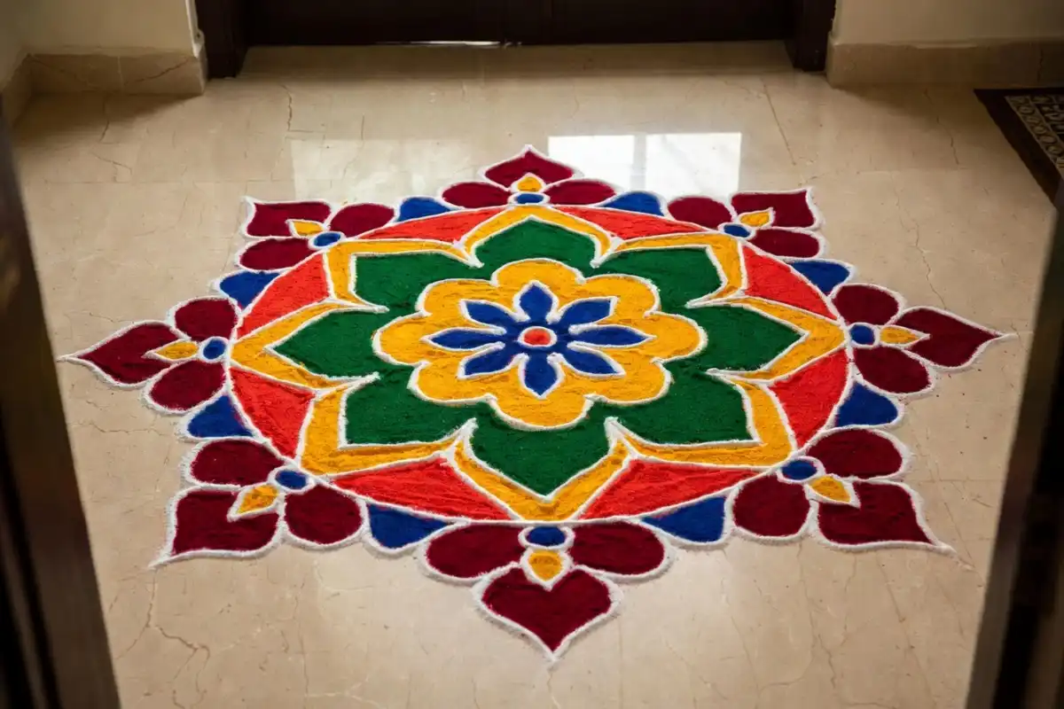 Traditional colorful rangoli ki design with floral patterns at home entrance