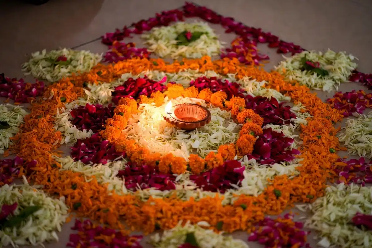 Beautiful floral rangoli simple design made with petals