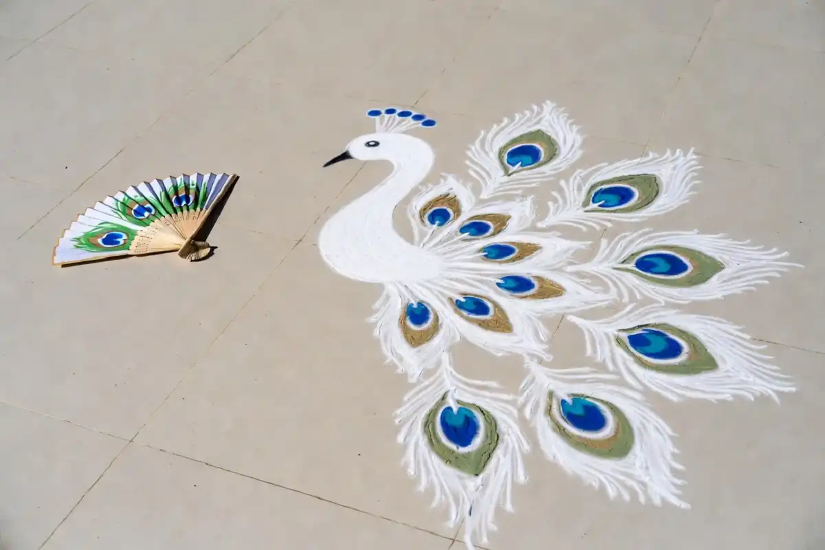 Simple peacock rangoli design for beginners