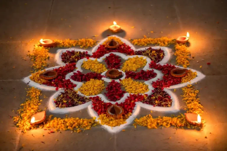 Simple rangoli design for Diwali with colorful floral pattern and diyas