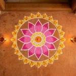 Beautiful simple rangoli design at home entrance with vibrant colors and diyas