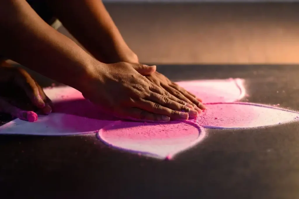 Close-up of 3D rangoli shading technique showing highlight and shadow on a flower petal