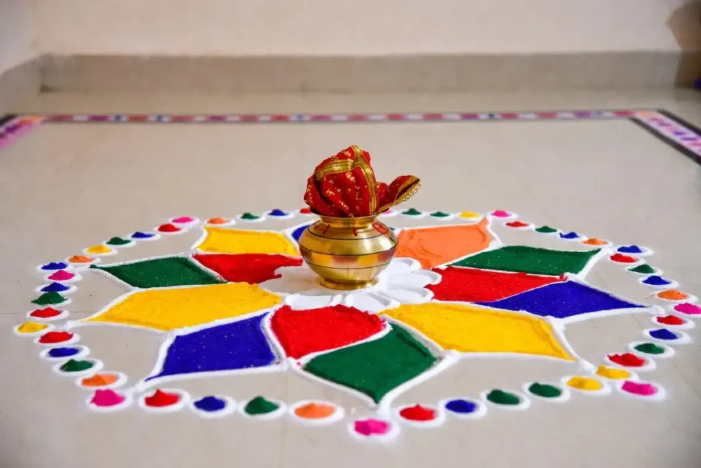 Easy Navratri rangoli kalash and lotus design with a dotted border