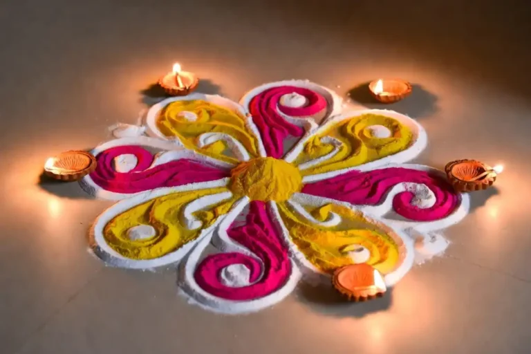 Quick rangoli ideas for beginners featuring a simple flower design with colorful powders