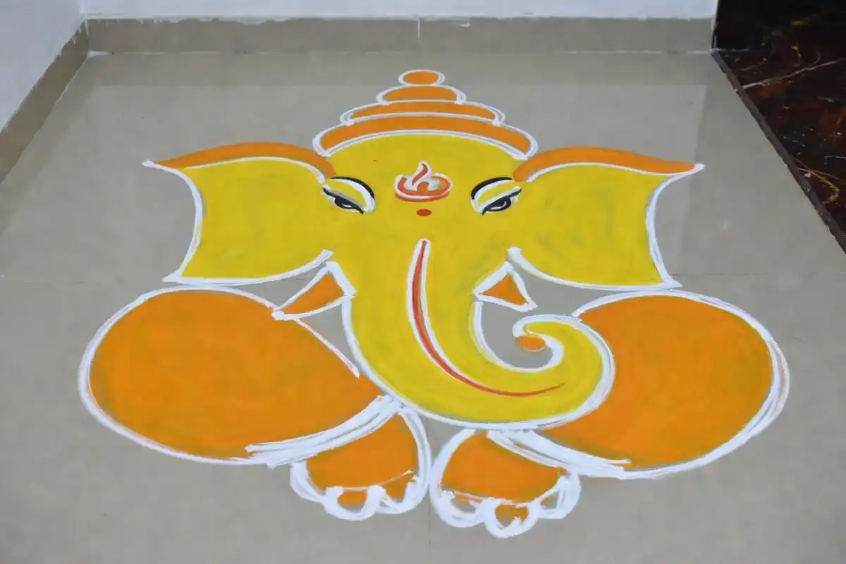 Beginner Ganesha rangoli design ideas with a simple trunk, ears, and flat color fill