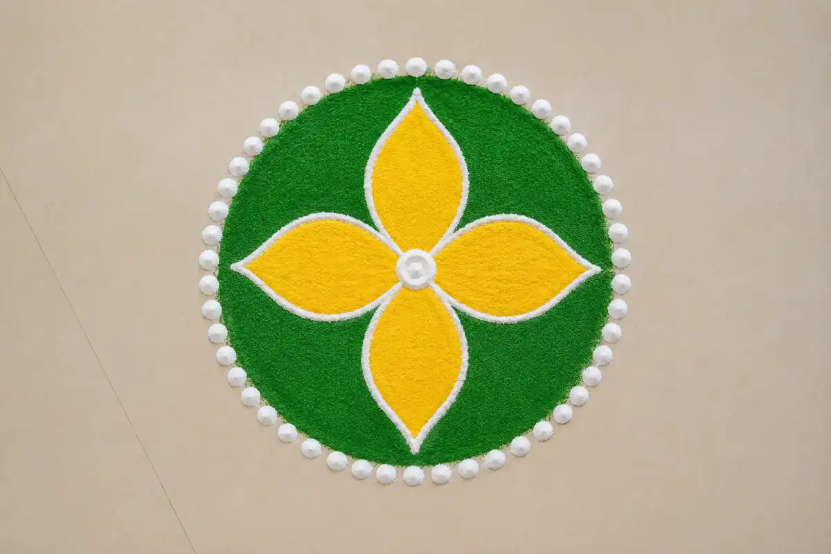 Simple Ugadi rangoli designs for beginners with a flower and dotted border