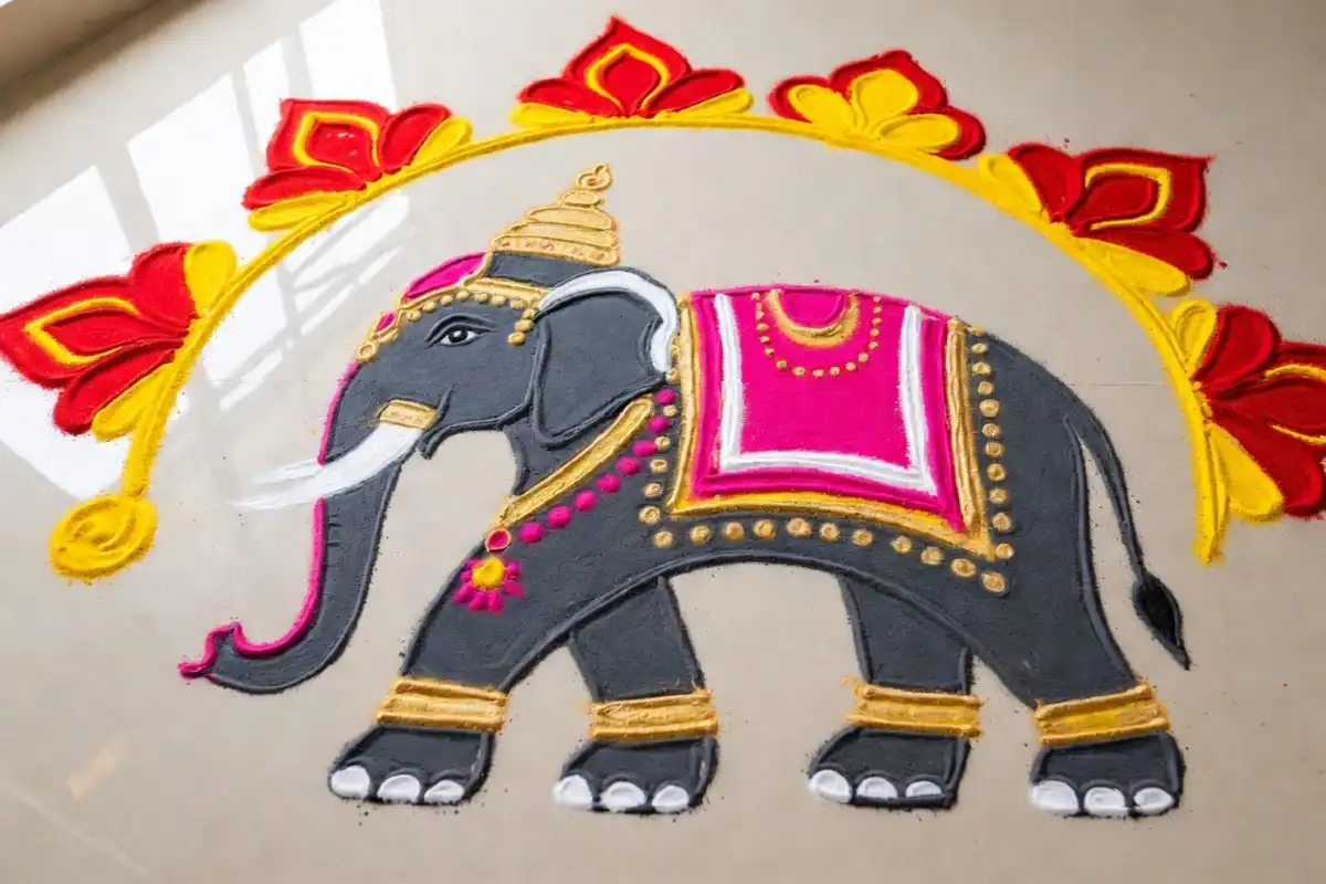 Simple single rangoli with elephant motif for a small home entrance