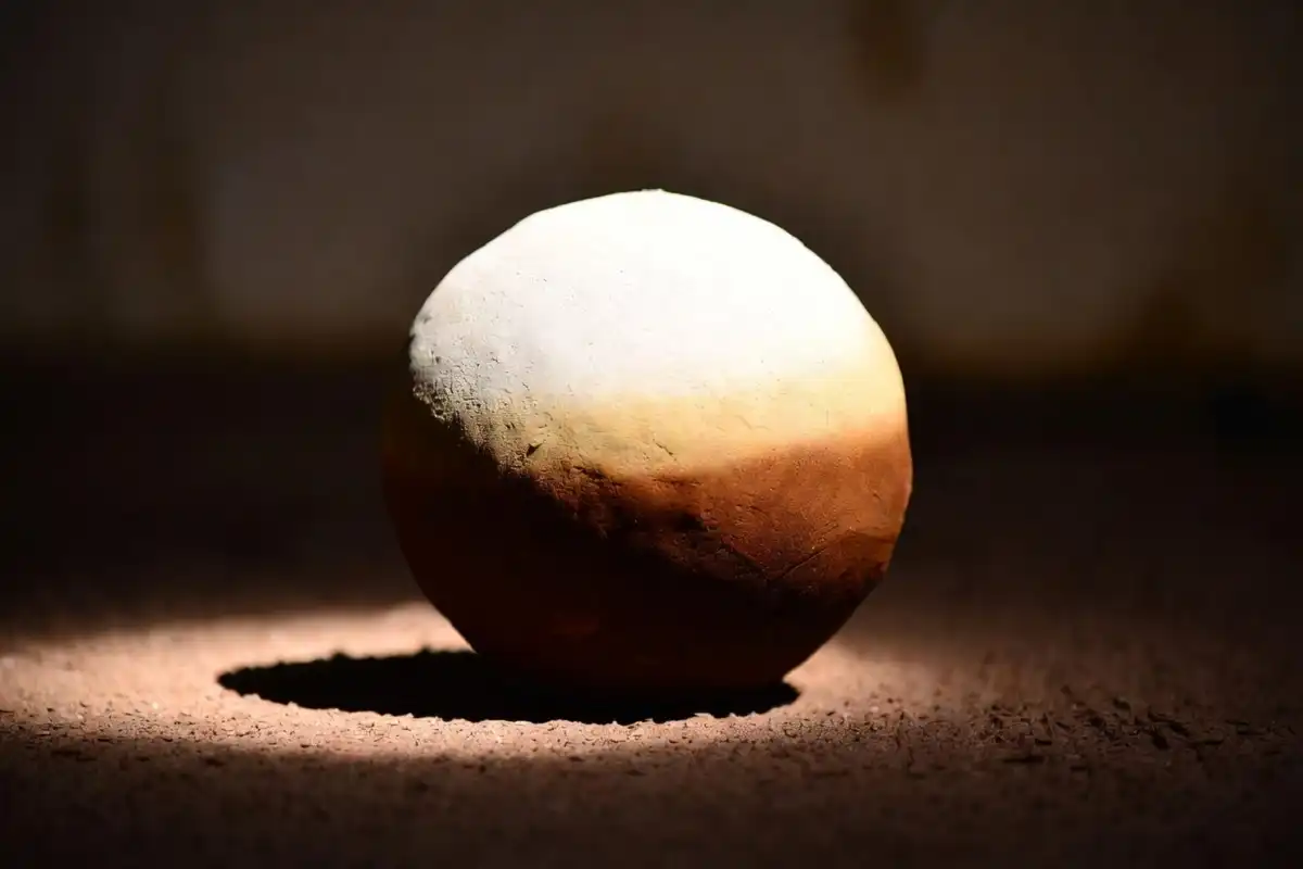 Shaded sphere showing how a 3D floating rangoli design creates the illusion of depth