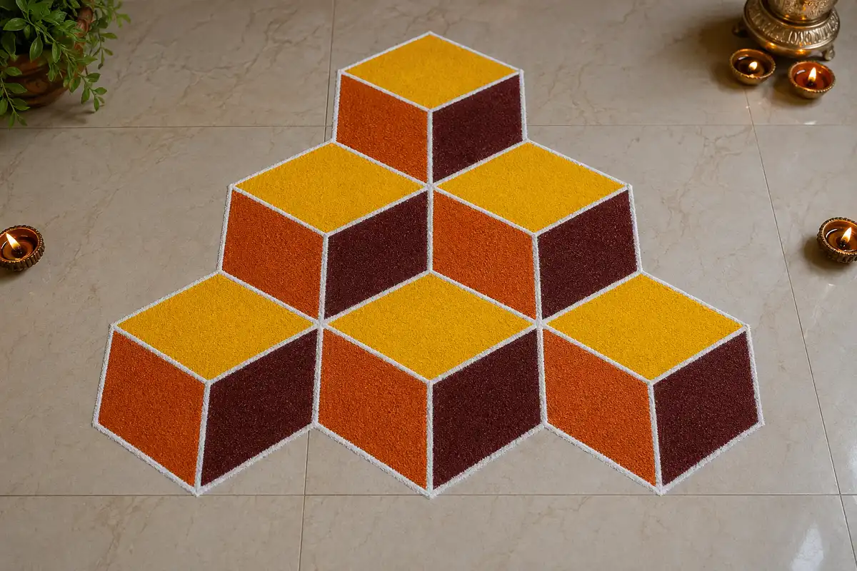 3D cube geometric rangoli with colorful shaded diamond shapes on a tiled floor