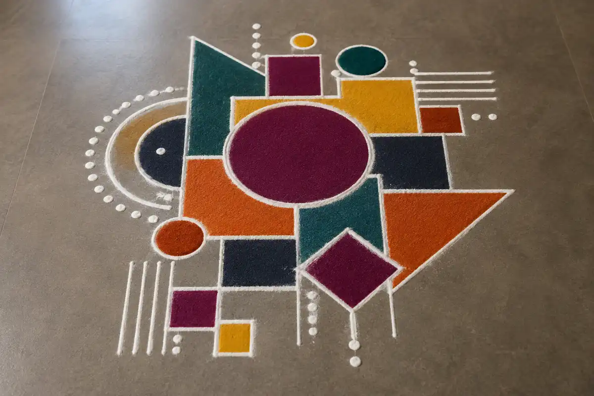 Colorful abstract geometric rangoli with circles, triangles, squares, diamonds and dots