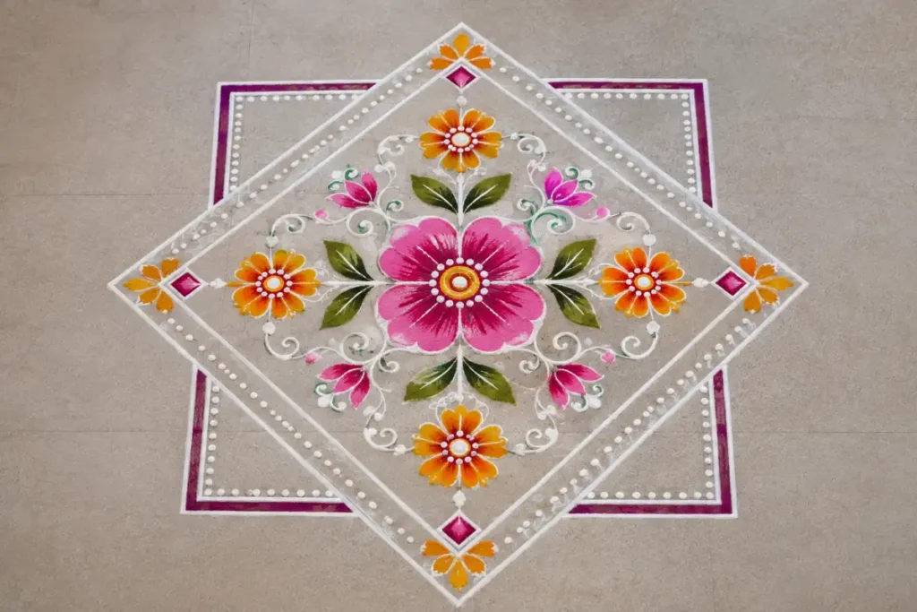 Colorful flower rangoli with a geometric diamond and square border