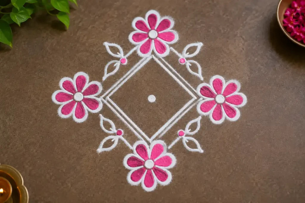 Four corner flower rangoli with a symmetrical diamond and leaf patterns
